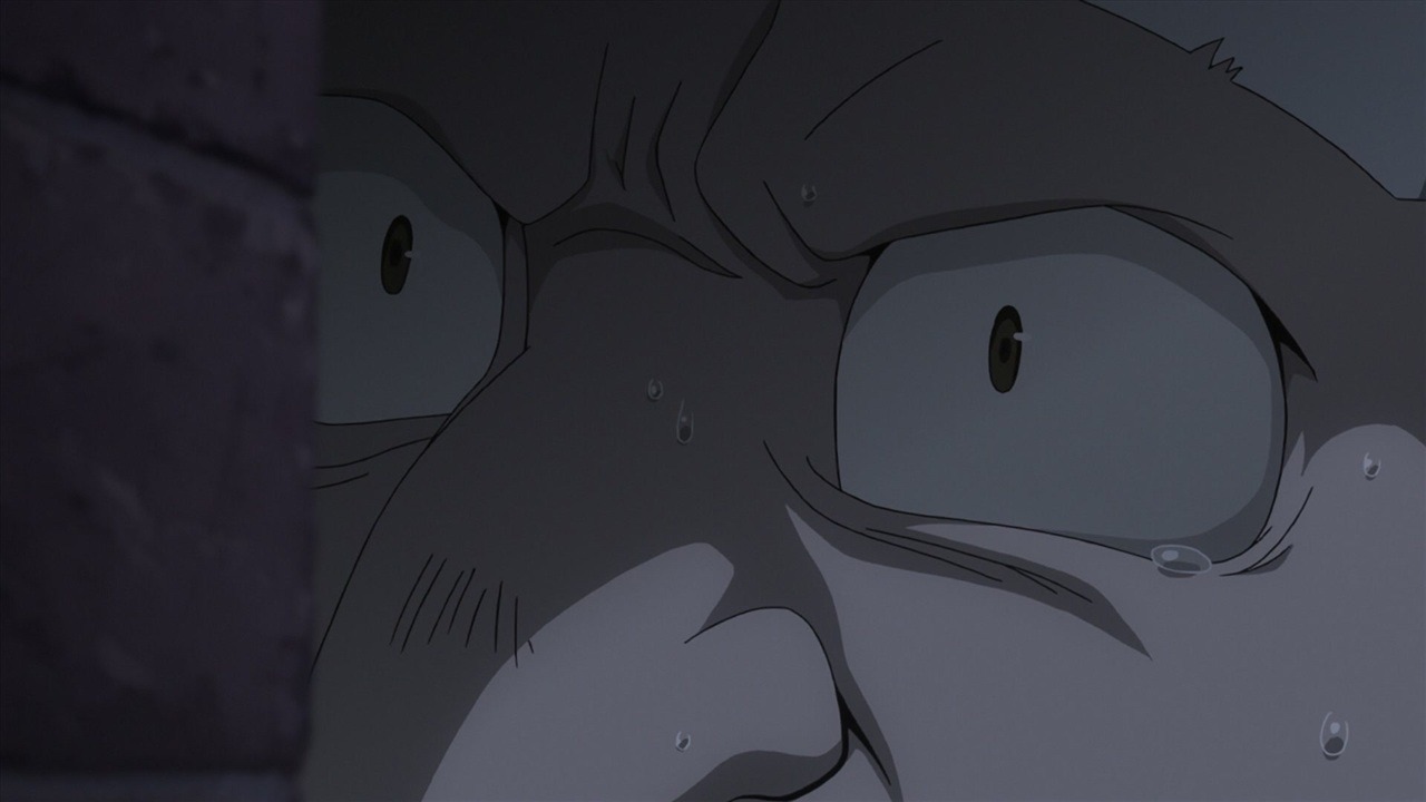 A screencap from Brotherhood. A closeup of Bido's face centered on his eye, filled with tears and looking angry.'